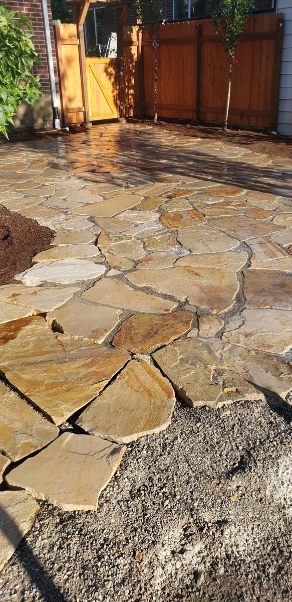 Flagstone patio installation